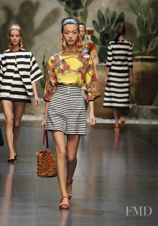 Tian Yi featured in  the Dolce & Gabbana fashion show for Spring/Summer 2013