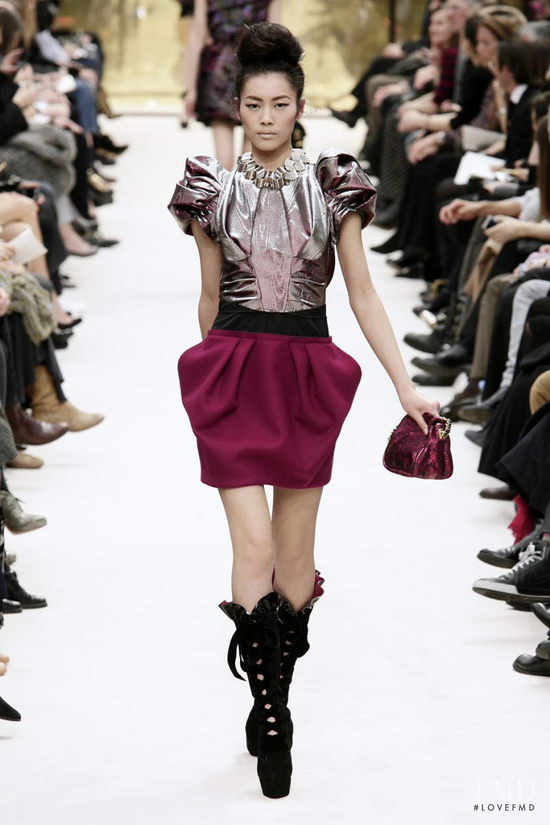 Liu Wen featured in  the Louis Vuitton fashion show for Autumn/Winter 2009