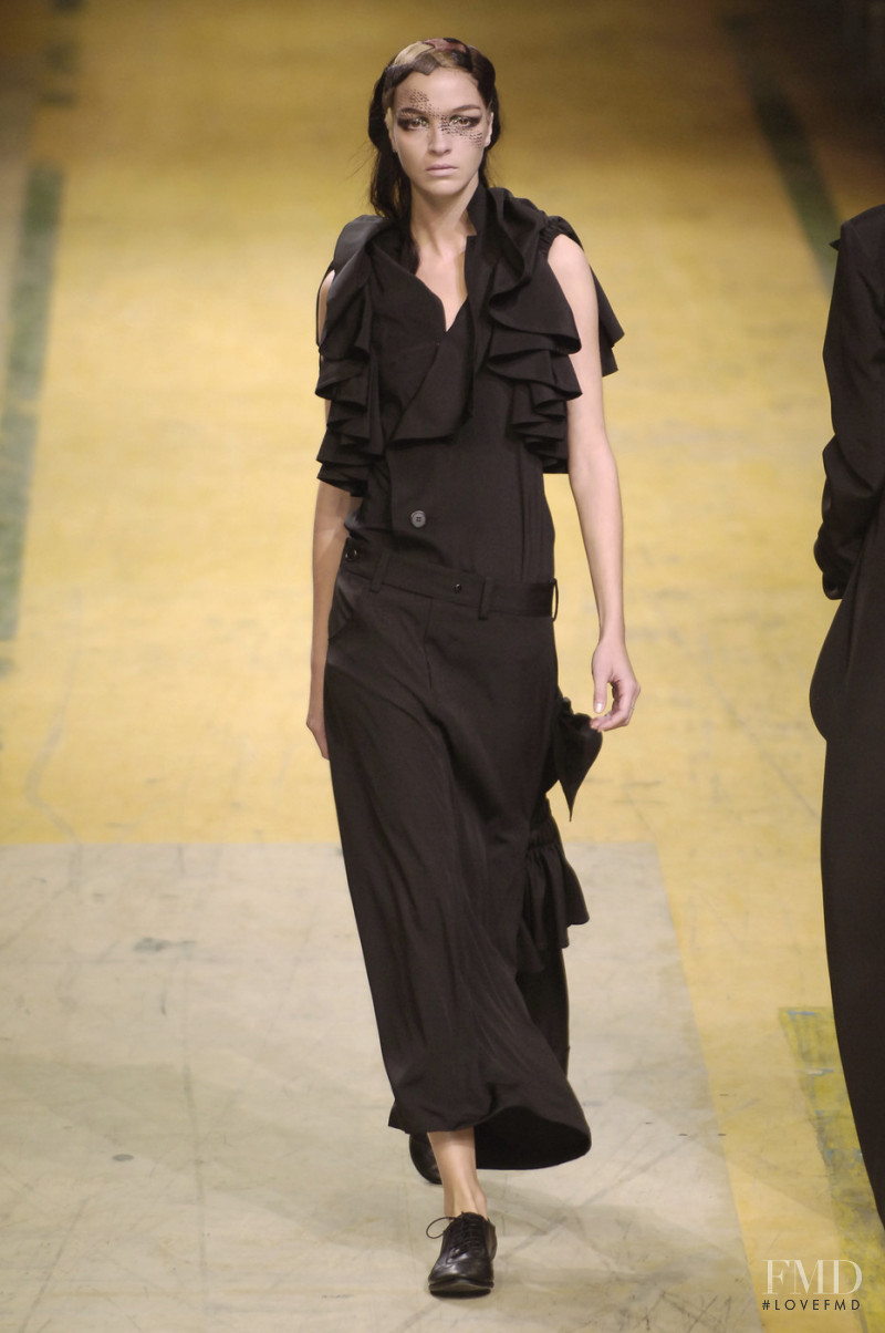 Mariacarla Boscono featured in  the Yohji Yamamoto fashion show for Spring/Summer 2006