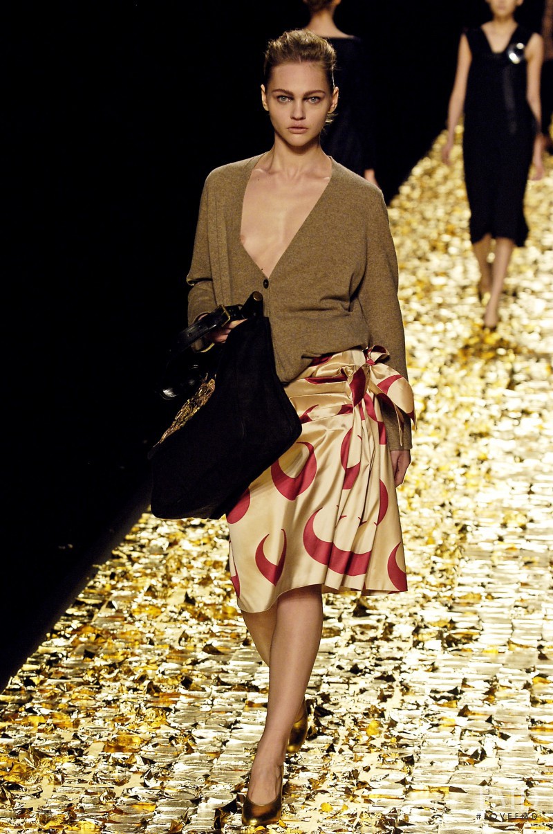 Sasha Pivovarova featured in  the Dries van Noten fashion show for Autumn/Winter 2006