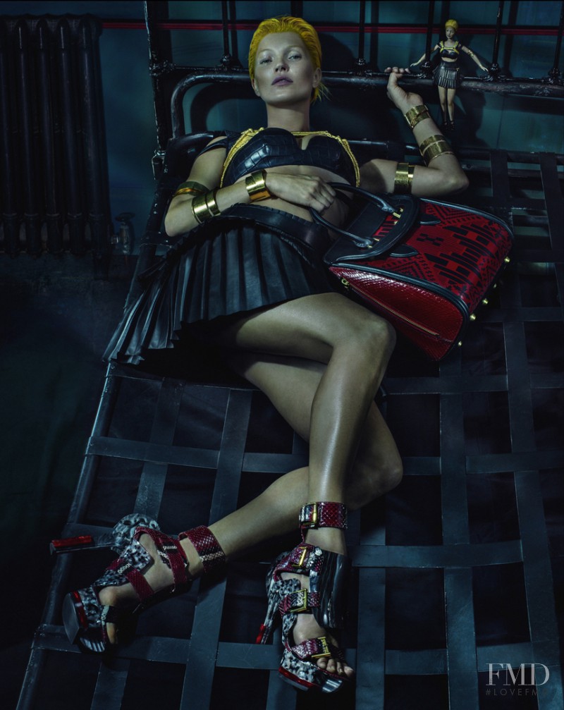 Kate Moss featured in  the Alexander McQueen advertisement for Spring/Summer 2014