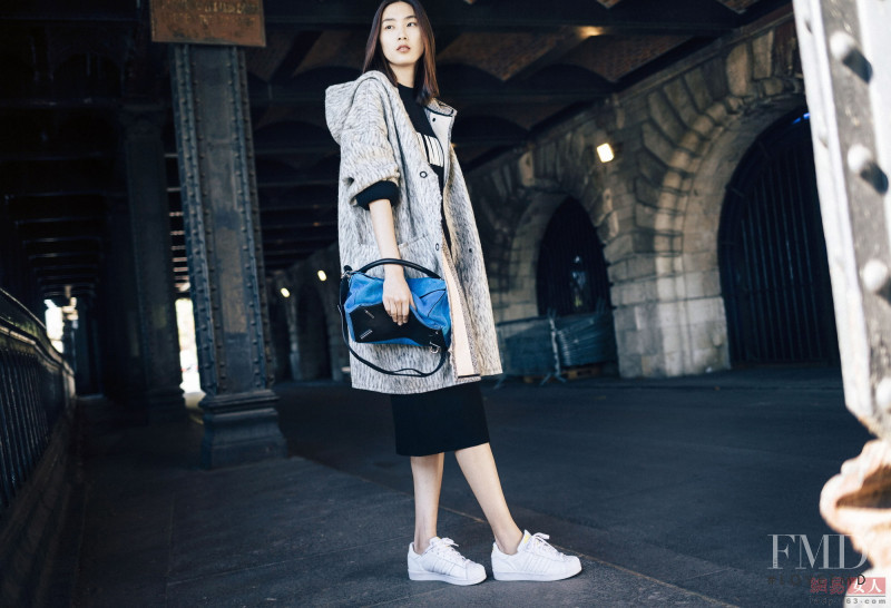 Dongqi Xue featured in  the MO&Co. lookbook for Fall 2015