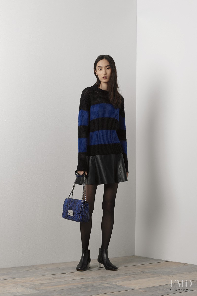 Dongqi Xue featured in  the Michael Kors Collection lookbook for Holiday 2015