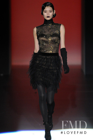 Ming Xi featured in  the Hannibal Laguna fashion show for Autumn/Winter 2012