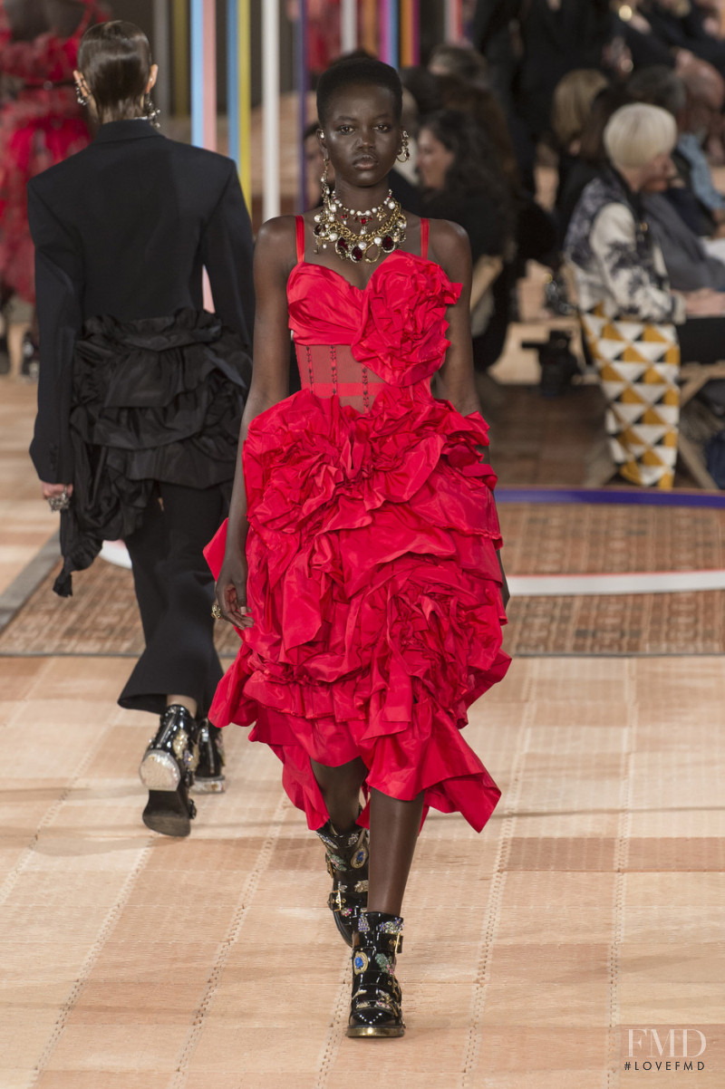 Adut Akech Bior featured in  the Alexander McQueen fashion show for Spring/Summer 2018