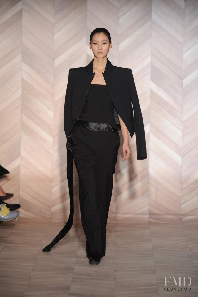 Lina Zhang featured in  the Maison Martin Margiela fashion show for Autumn/Winter 2012