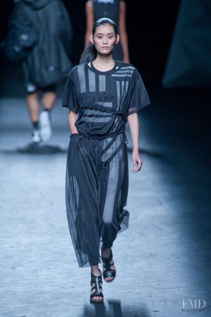 Ming Xi featured in  the Y-3 fashion show for Spring/Summer 2013