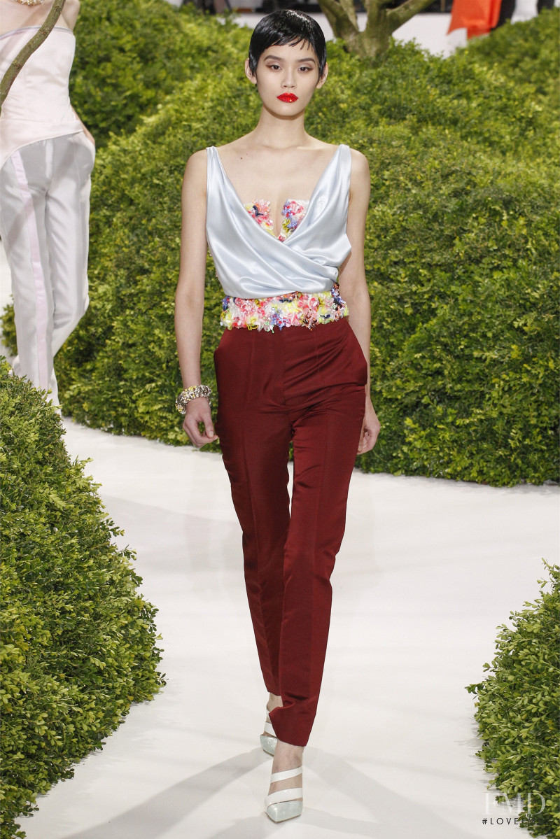 Ming Xi featured in  the Christian Dior Haute Couture fashion show for Spring/Summer 2013
