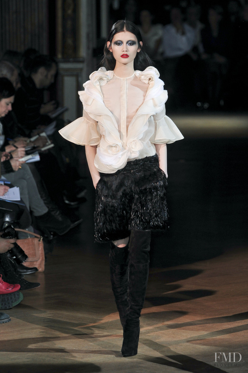 Ming Xi featured in  the Givenchy fashion show for Autumn/Winter 2011