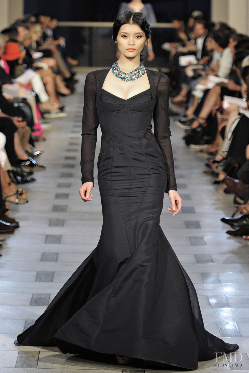 Ming Xi featured in  the Zac Posen fashion show for Spring/Summer 2012