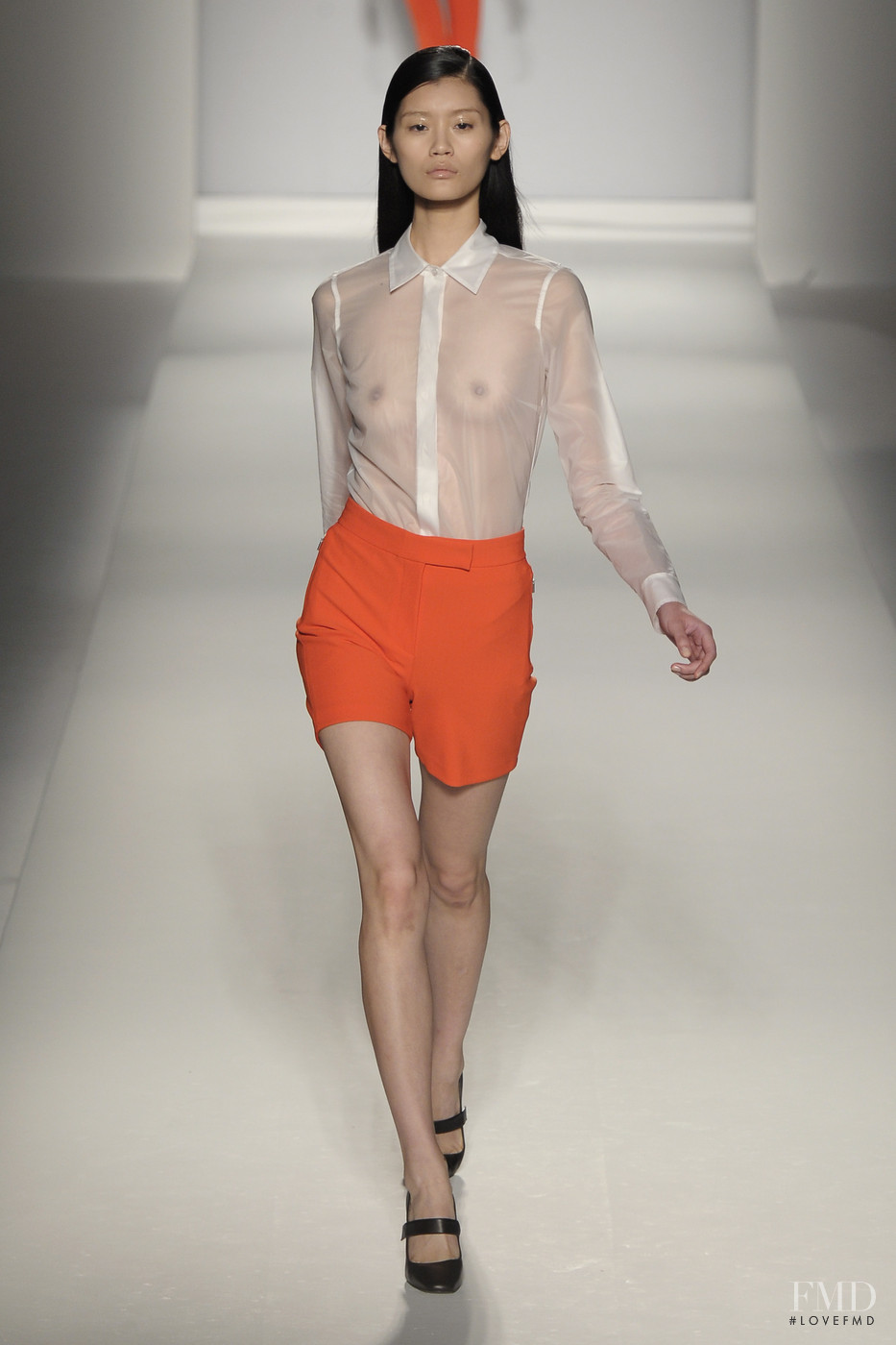 Ming Xi featured in the Max Mara fashion show for Spring/Summer 2011.