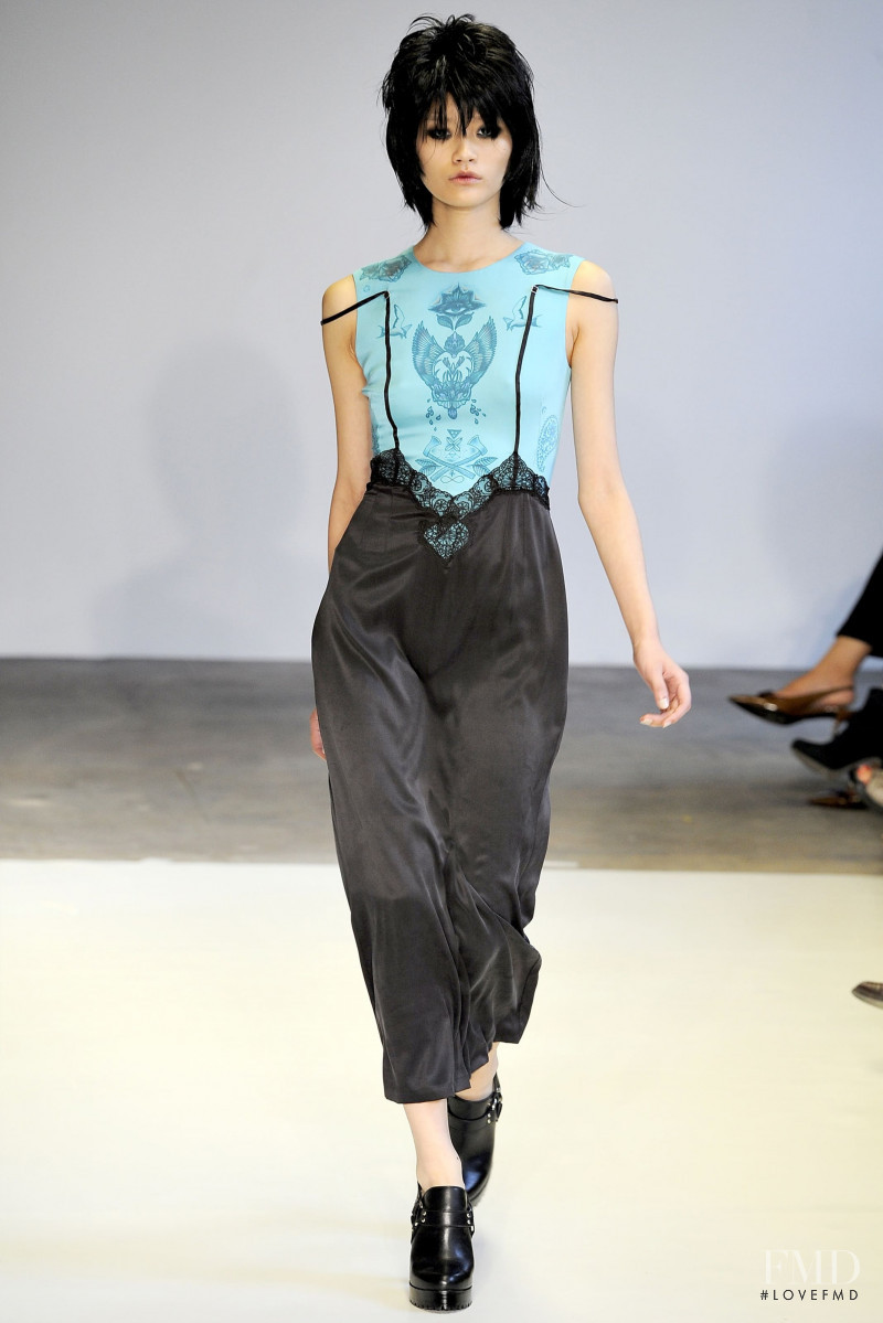Ming Xi featured in  the Marios Schwab fashion show for Spring/Summer 2011