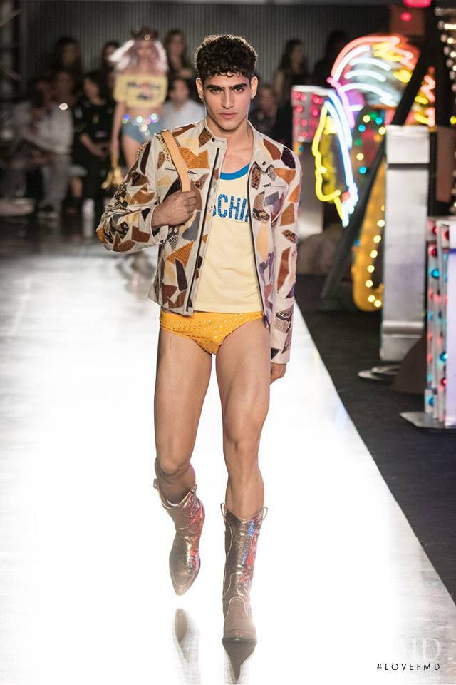 Jhonattan Burjack featured in  the Moschino fashion show for Spring/Summer 2018