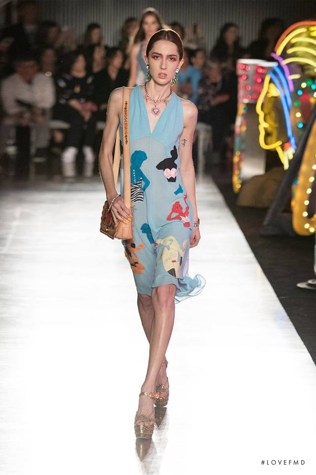 Teddy Quinlivan featured in  the Moschino fashion show for Spring/Summer 2018