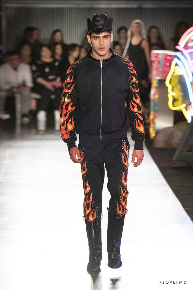 Jhonattan Burjack featured in  the Moschino fashion show for Spring/Summer 2018