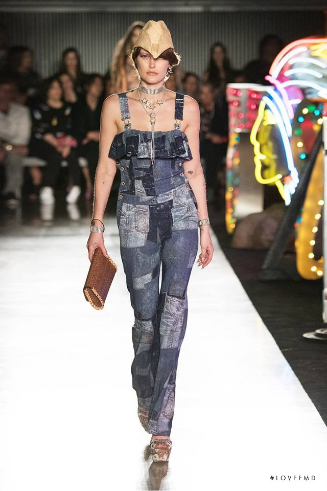 Catherine McNeil featured in  the Moschino fashion show for Spring/Summer 2018