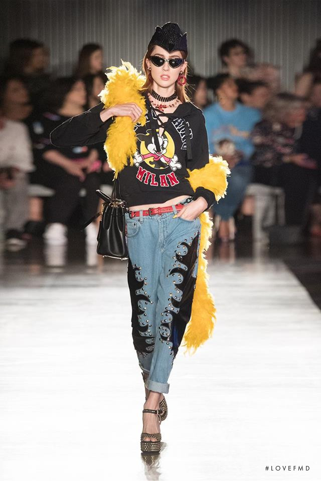 Teddy Quinlivan featured in  the Moschino fashion show for Spring/Summer 2018