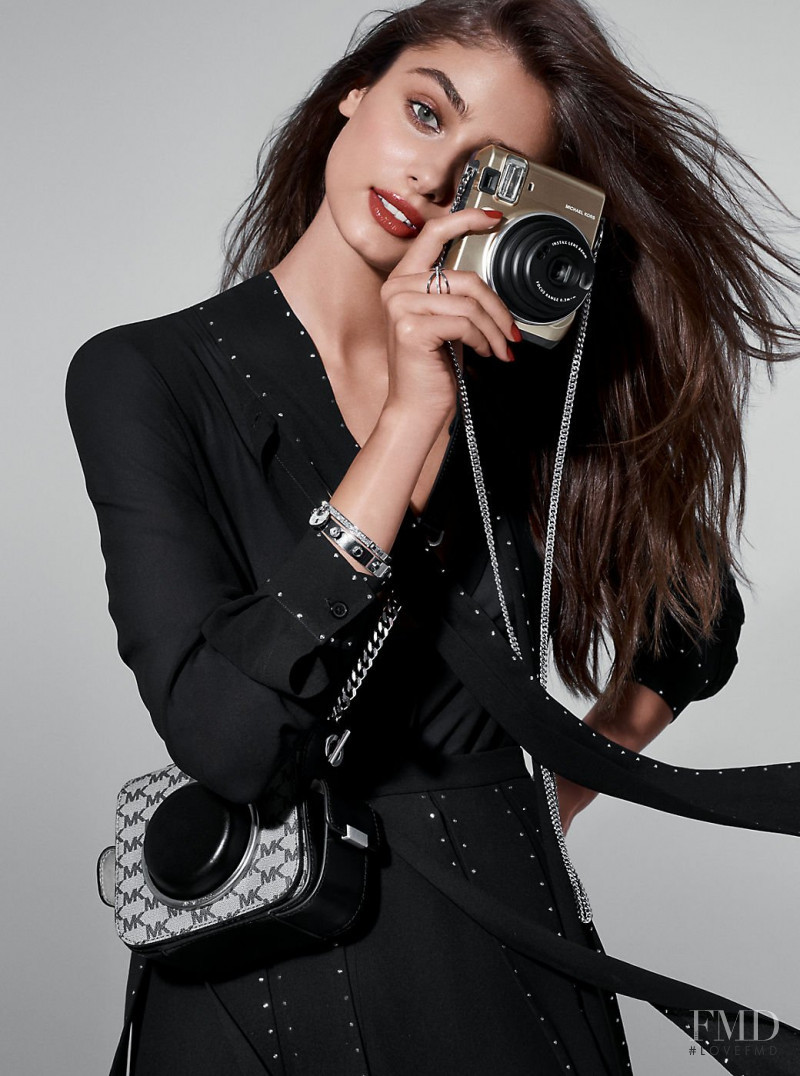 Taylor Hill featured in  the Michael Kors Collection advertisement for Holiday 2016