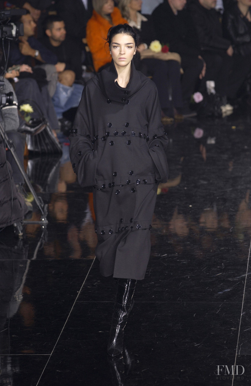 Mariacarla Boscono featured in  the Dolce & Gabbana fashion show for Autumn/Winter 2003