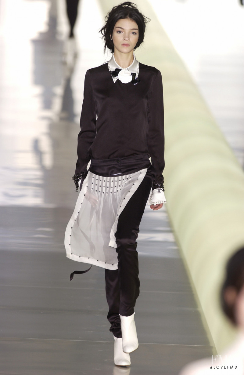 Mariacarla Boscono featured in  the Chanel fashion show for Autumn/Winter 2003