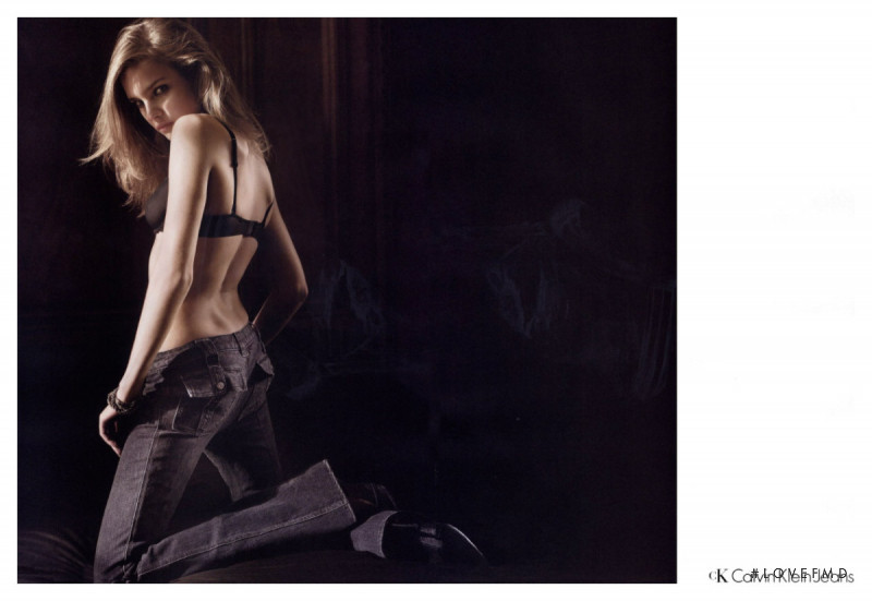 Natalia Vodianova featured in  the Calvin Klein Jeans advertisement for Autumn/Winter 2003