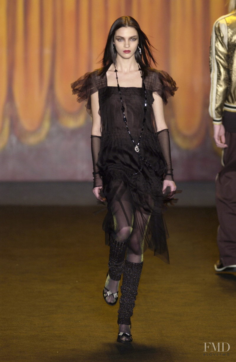 Mariacarla Boscono featured in  the Anna Sui fashion show for Autumn/Winter 2003