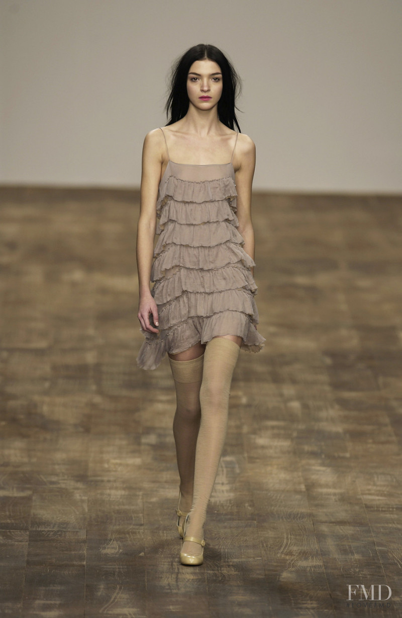 Mariacarla Boscono featured in  the Anna Molinari fashion show for Autumn/Winter 2003