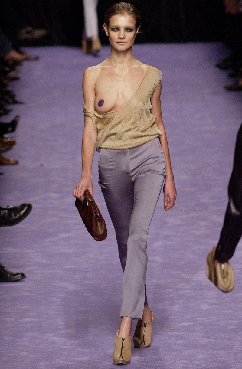 Natalia Vodianova featured in  the Saint Laurent fashion show for Spring/Summer 2003