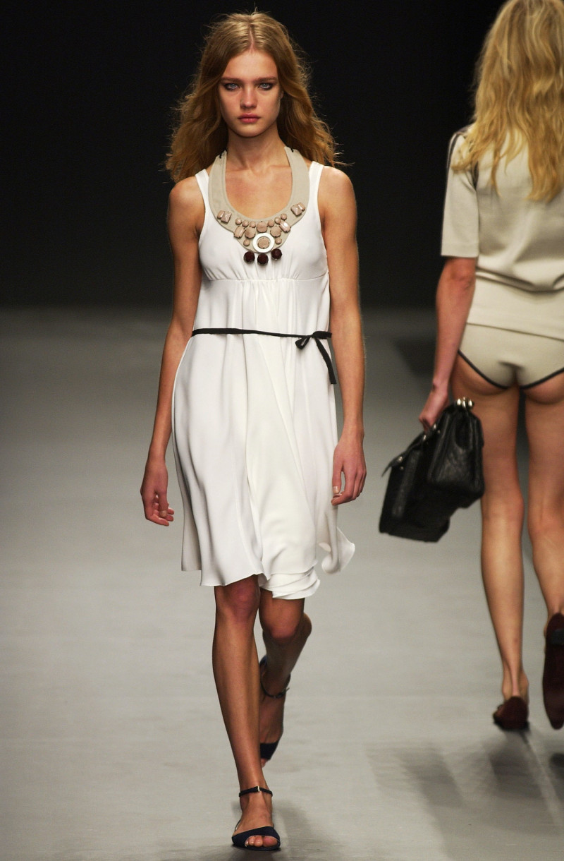 Natalia Vodianova featured in  the Prada fashion show for Spring/Summer 2003