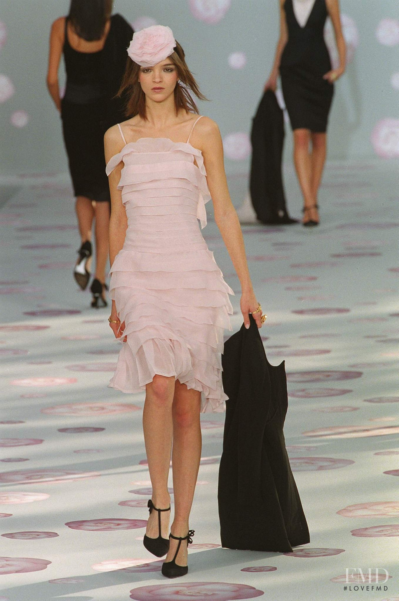 Mariacarla Boscono featured in  the Chanel Haute Couture fashion show for Spring/Summer 2002