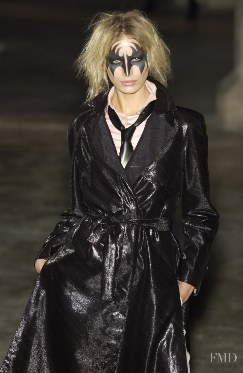 Karolina Kurkova featured in  the Alexander McQueen fashion show for Autumn/Winter 2002