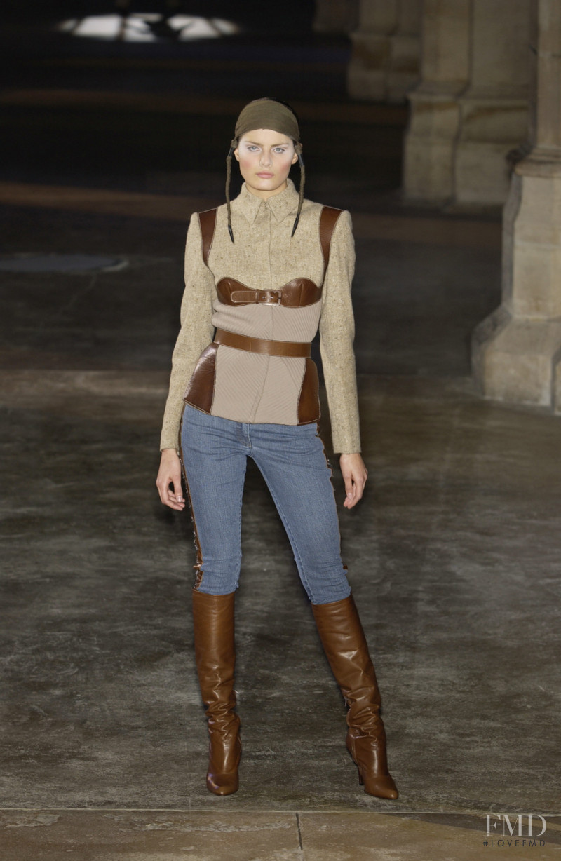 Isabeli Fontana featured in  the Alexander McQueen fashion show for Autumn/Winter 2002