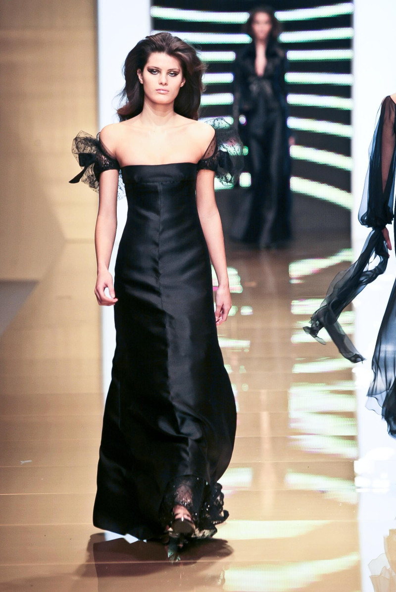 Isabeli Fontana featured in  the Valentino fashion show for Autumn/Winter 2002