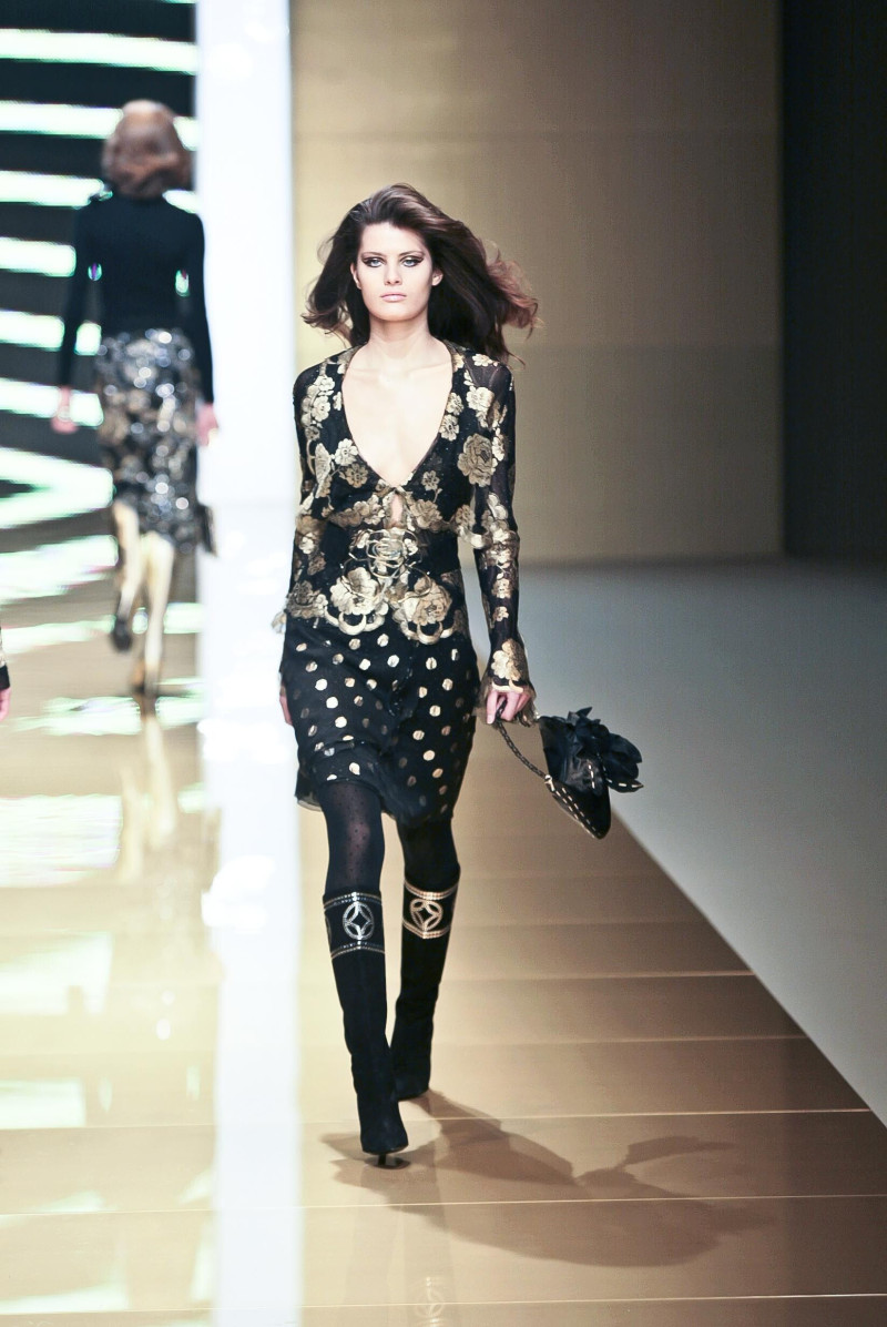 Isabeli Fontana featured in  the Valentino fashion show for Autumn/Winter 2002
