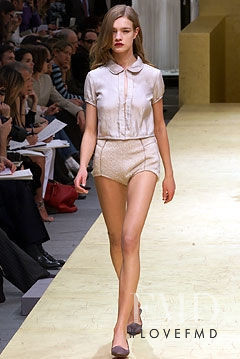Natalia Vodianova featured in  the Louis Vuitton fashion show for Autumn/Winter 2002