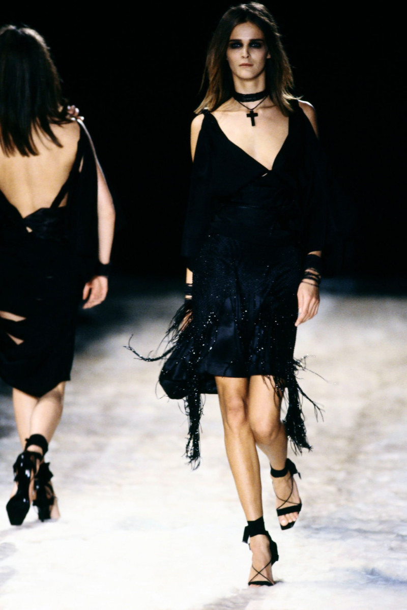 Carmen Kass featured in  the Gucci fashion show for Autumn/Winter 2002
