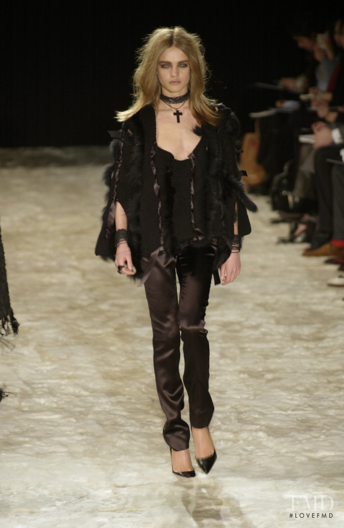 Natalia Vodianova featured in  the Gucci fashion show for Autumn/Winter 2002