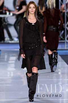 Mariacarla Boscono featured in  the Chanel fashion show for Autumn/Winter 2002