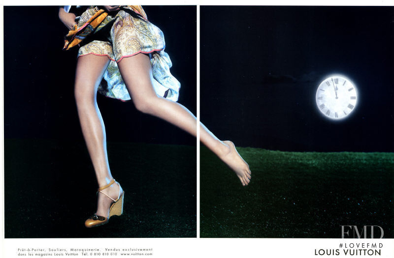 Natalia Vodianova featured in  the Louis Vuitton advertisement for Spring/Summer 2002