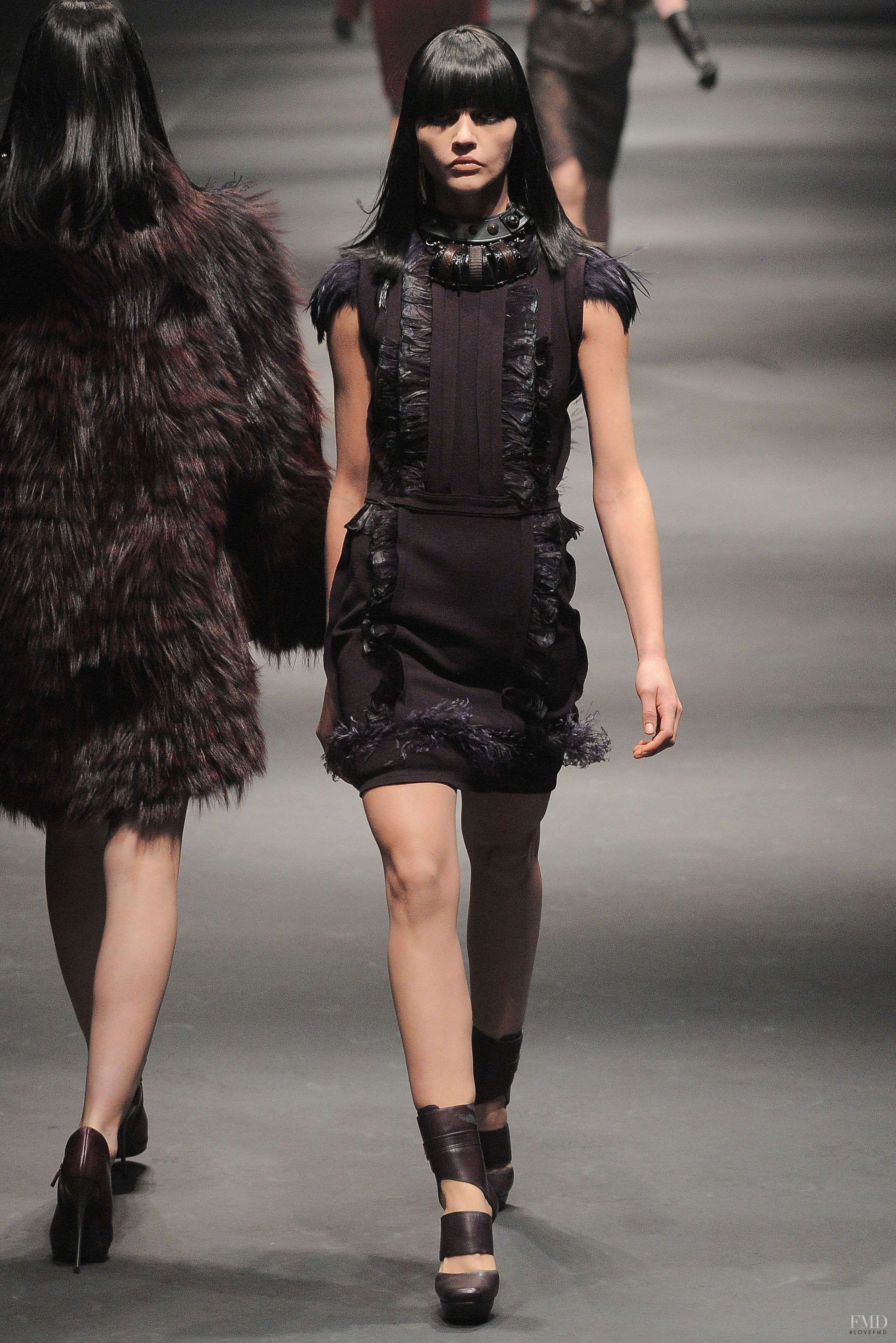 Model Carmen Kass on the runway at the Lanvin fashion show during