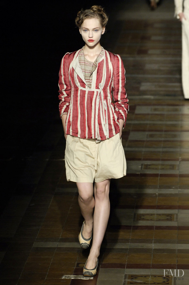 Sasha Pivovarova featured in  the Dries van Noten fashion show for Spring/Summer 2006