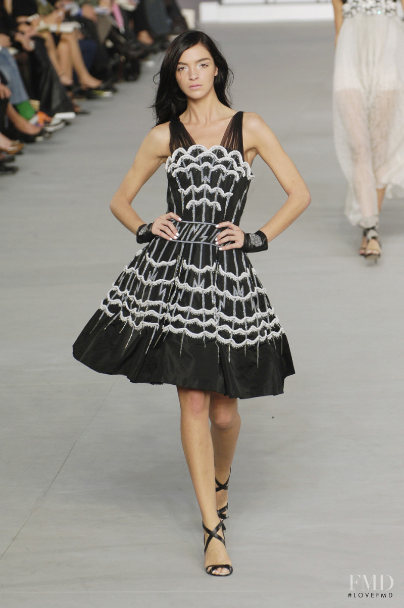 Mariacarla Boscono featured in  the Chanel fashion show for Spring/Summer 2006