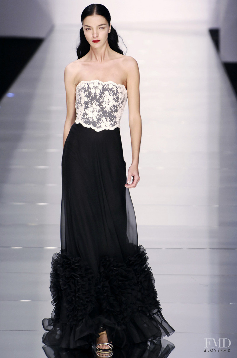 Mariacarla Boscono featured in  the Valentino fashion show for Spring/Summer 2006