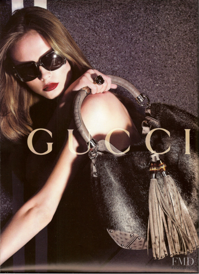Natasha Poly featured in  the Gucci Indy Bag advertisement for Autumn/Winter 2007
