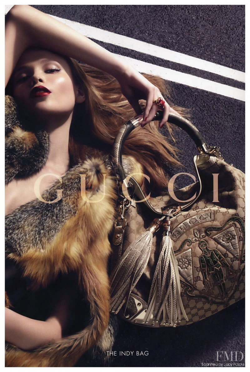 Natasha Poly featured in  the Gucci Indy Bag advertisement for Autumn/Winter 2007