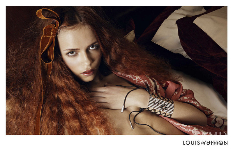 Natasha Poly featured in  the Louis Vuitton advertisement for Autumn/Winter 2004