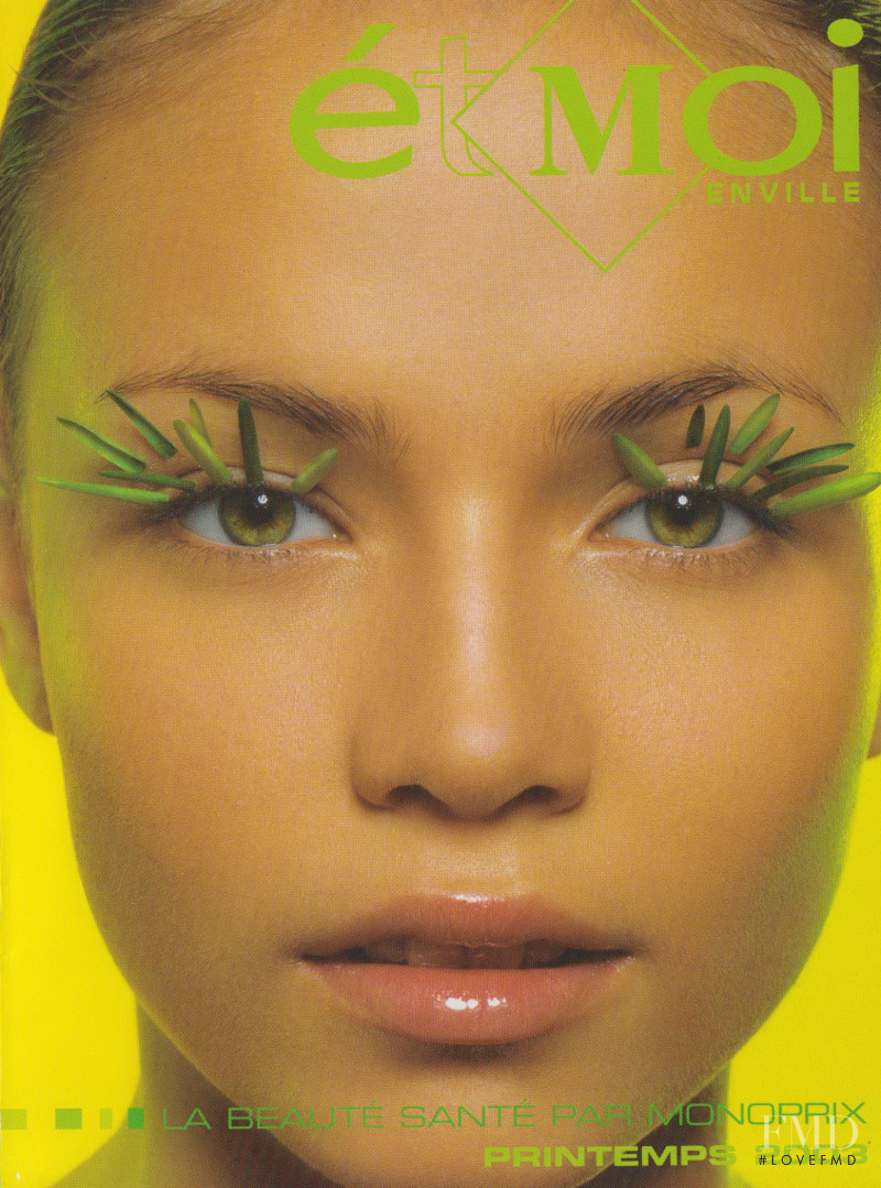 Natasha Poly featured in  the Monoprix advertisement for Spring/Summer 2004