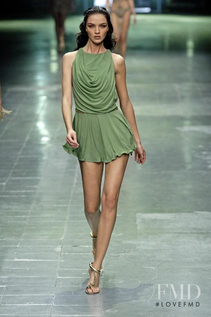 Mariacarla Boscono featured in  the Alexander McQueen fashion show for Spring/Summer 2006