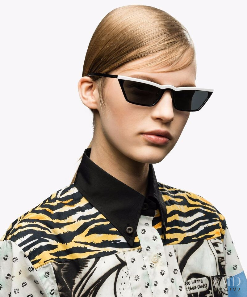 Aivita Muze featured in  the Prada Eyewear advertisement for Spring/Summer 2018