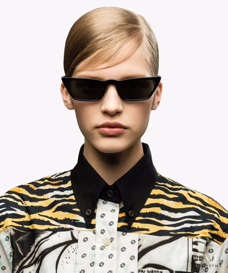 Aivita Muze featured in  the Prada Eyewear advertisement for Spring/Summer 2018